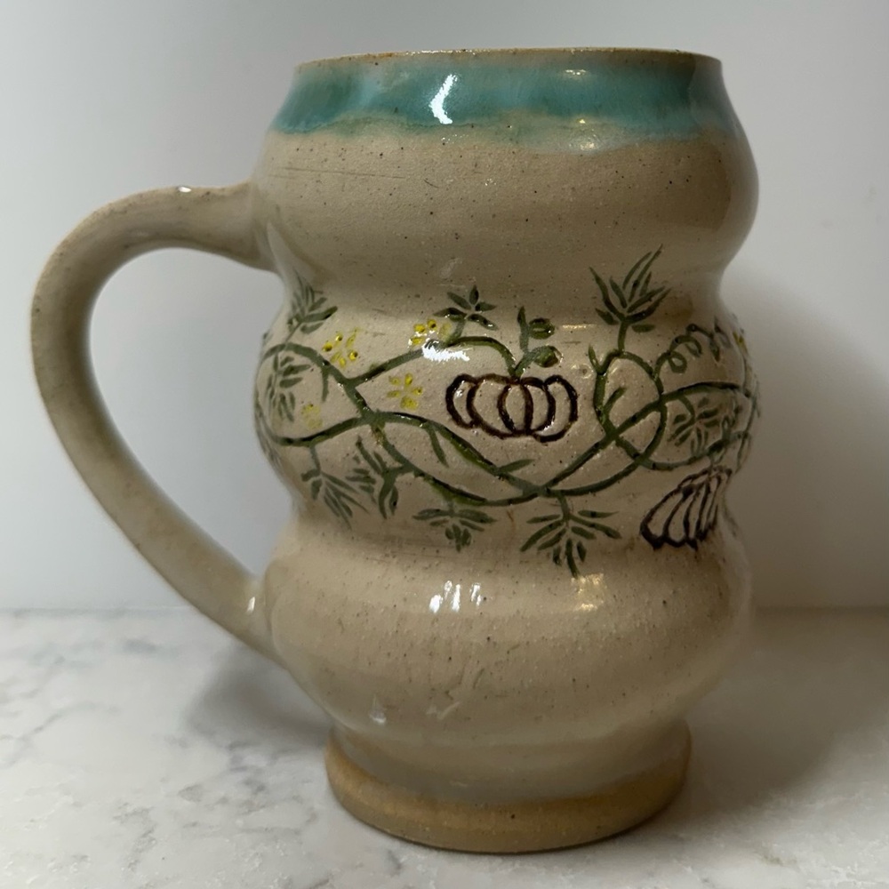 Handcrafted Ceramic Mug with Pumpkin Vine Design